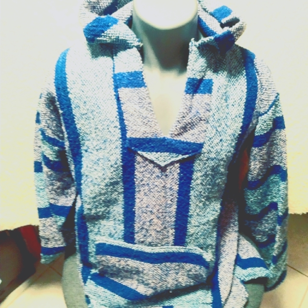 Hooded knit pullover.  Barely used.    Has 1 large reach threw pocket. very warm